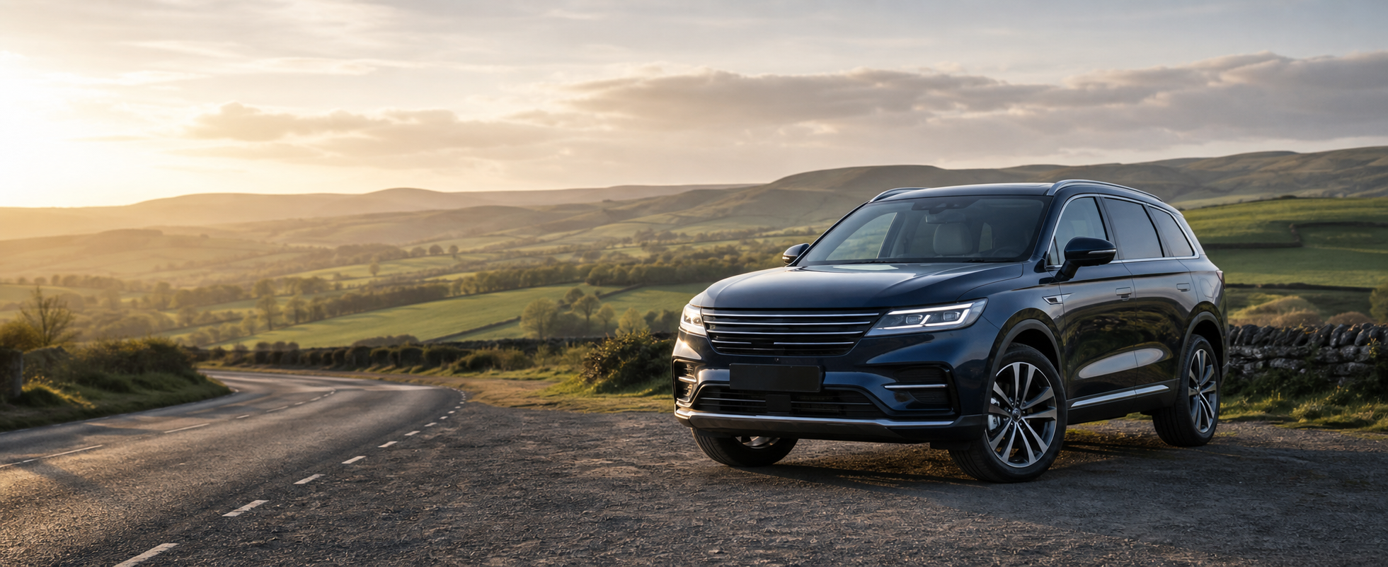 Dark blue car overlooking the British countryside